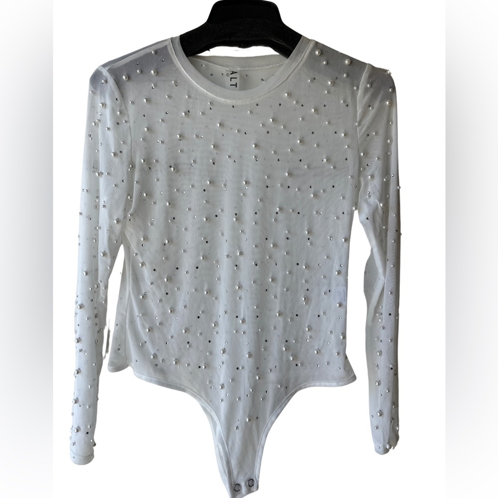 White mesh bodysuit with pearls.